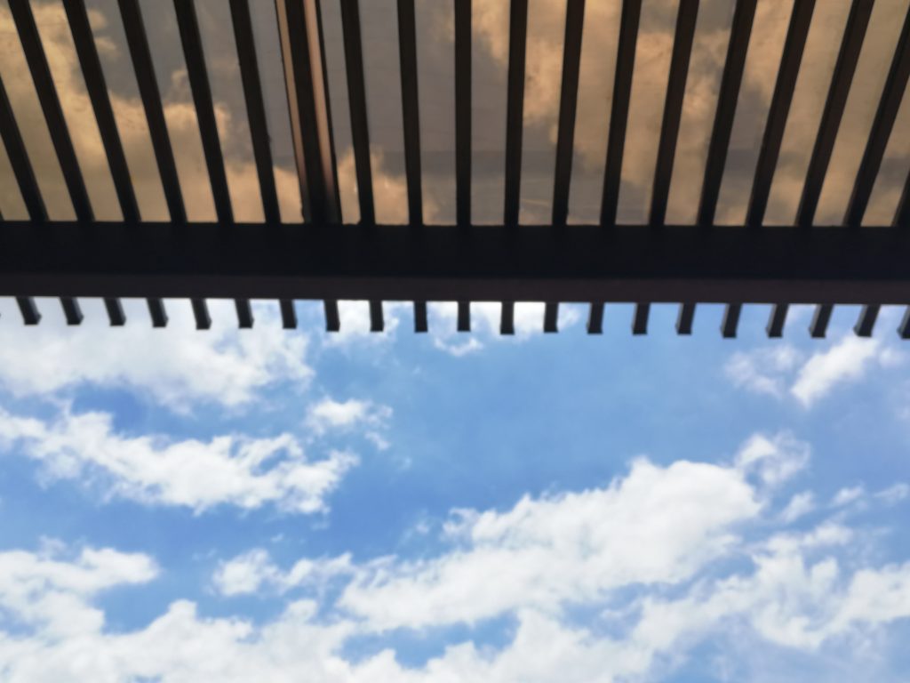 a clear plastic pergola roof