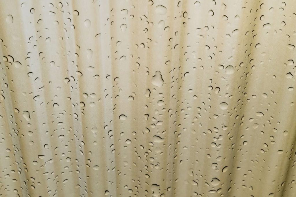 rain drops on a polycarbonate pergola cover
