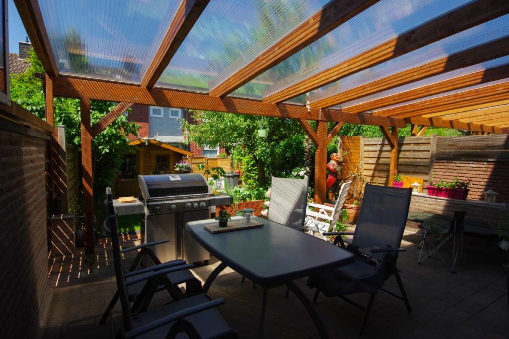 plastic pergola cover protecting from sun on a patio