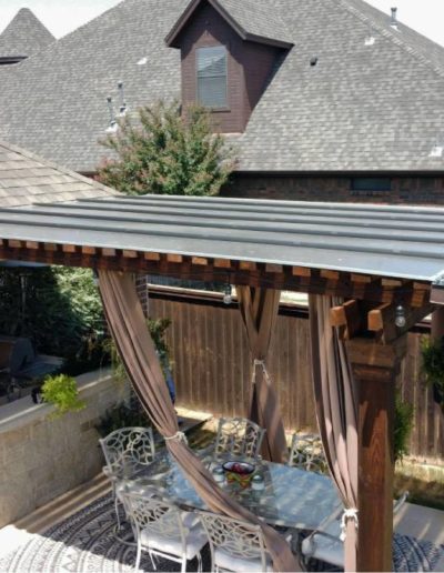 Polycarbonate plastic pergola cover over outdoor living area in Denver, CO